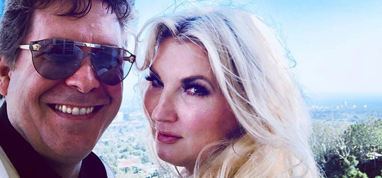 Mark Malatesta wearing sunglassses with Ingrid Elfver